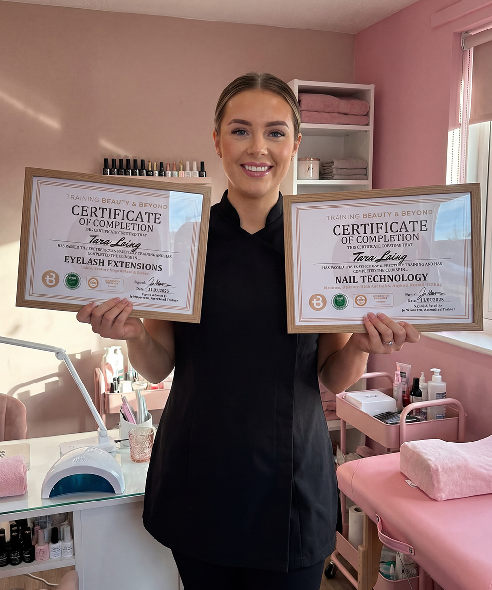 Student Tara Holding her eyelash extension and nail tech certificates