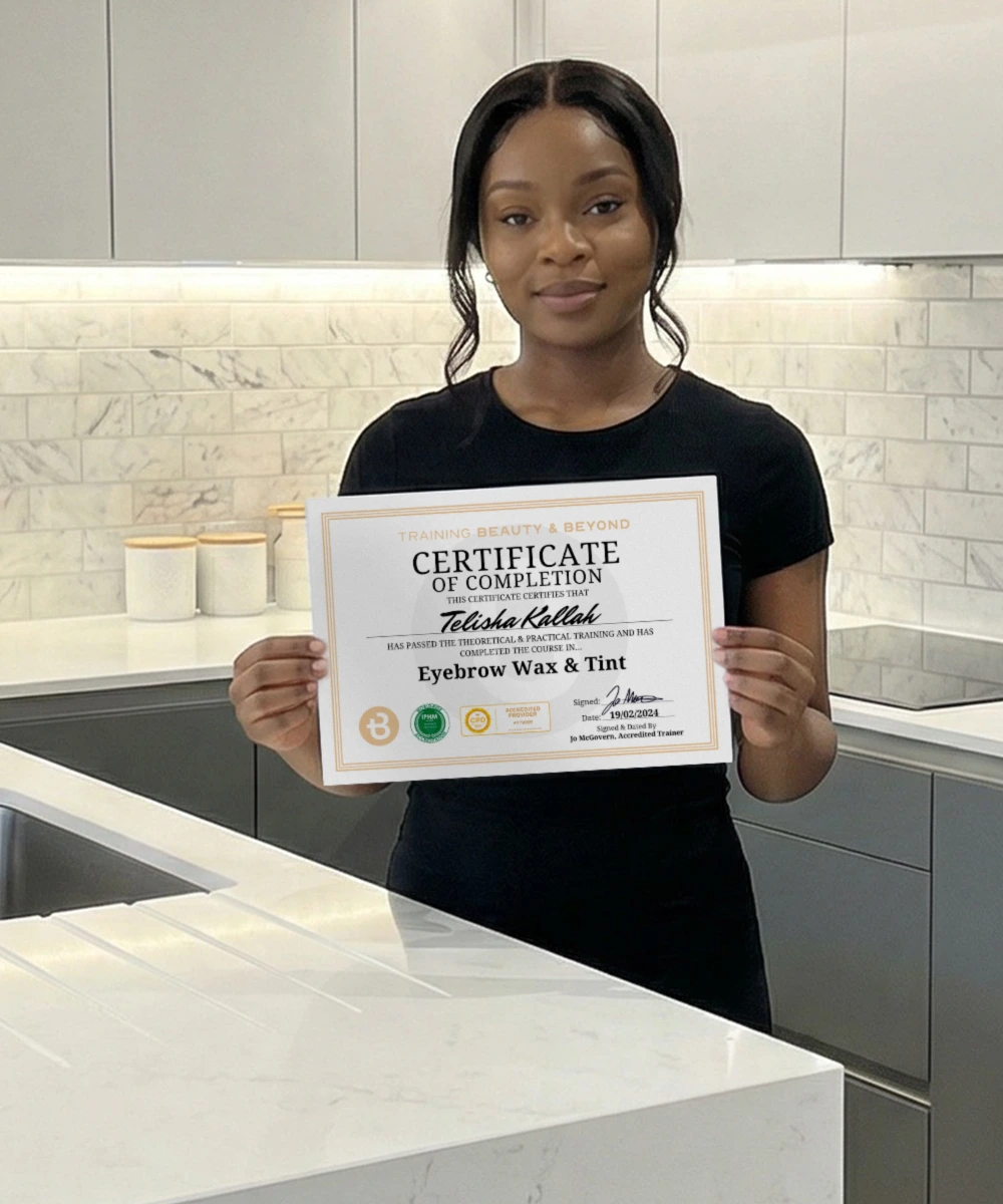 Student Telisha holding Eyebrow Wax & Tint certificate